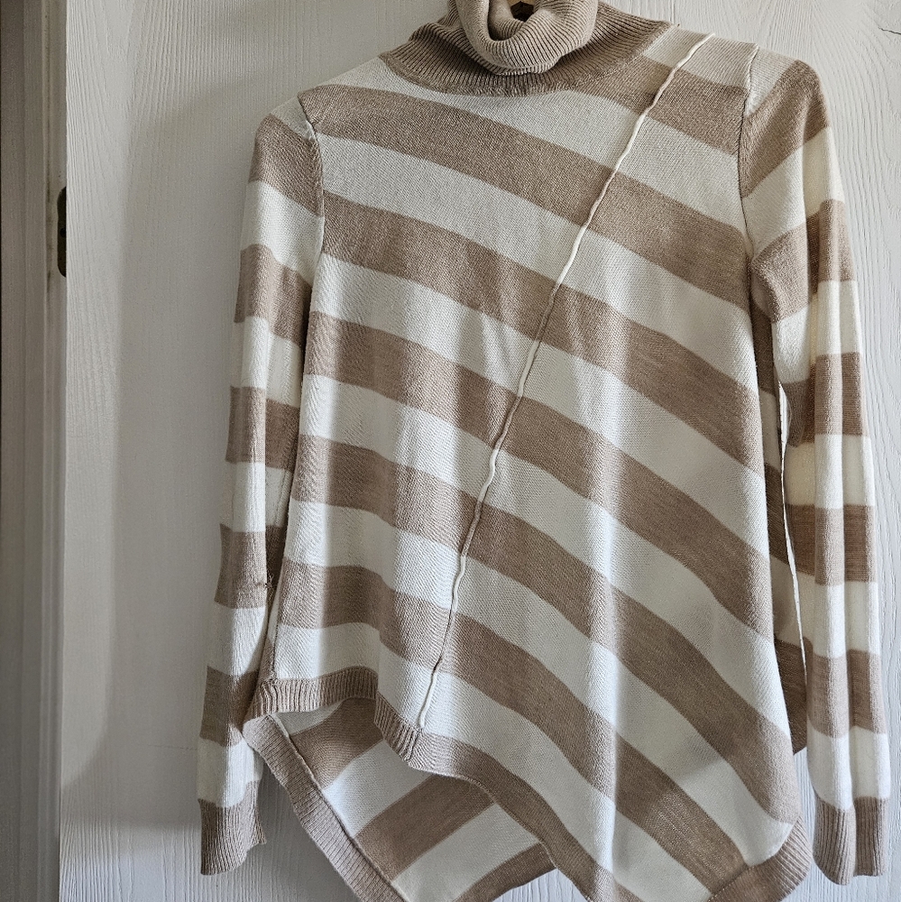 Women's turleneck sweater. Asymmetrical.